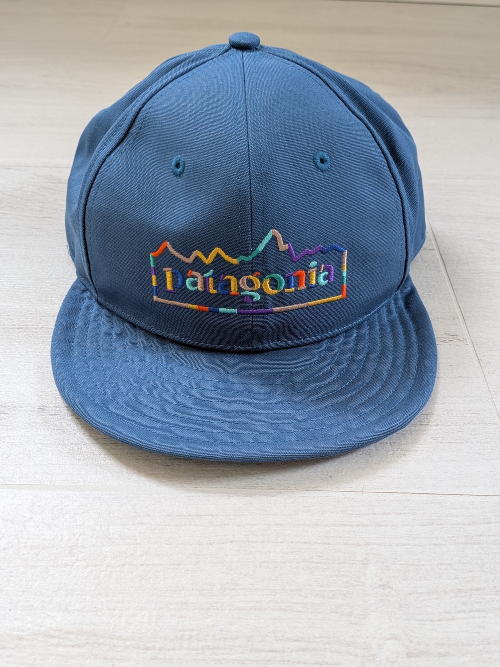 Patagonia Kids Slate Blue Snapback Hat with Rainbow Logo Embroidery